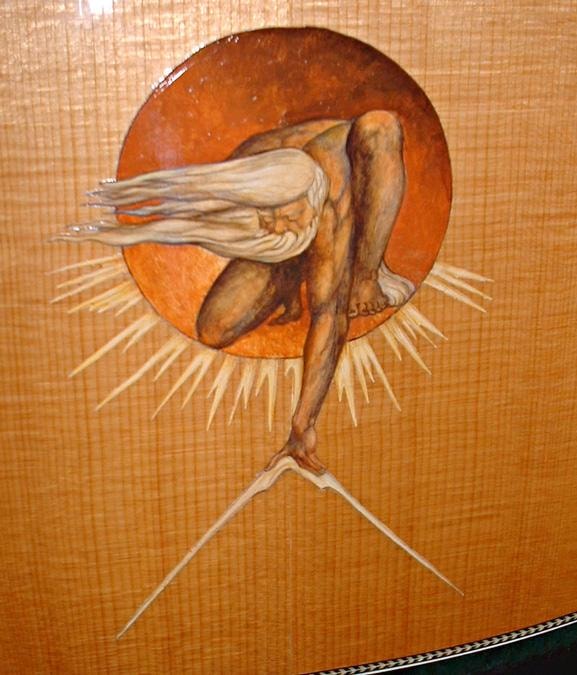 Close-up detail of the Ancient of Days figure painted on the guitar soundboard