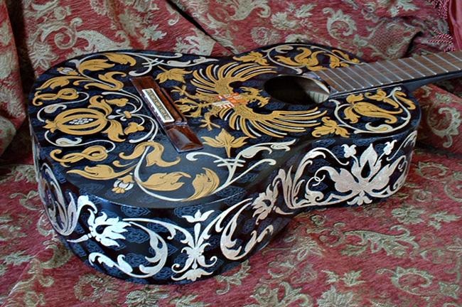 Rib detail of the Hapsburg guitar showing gold leaf scrollwork ornament