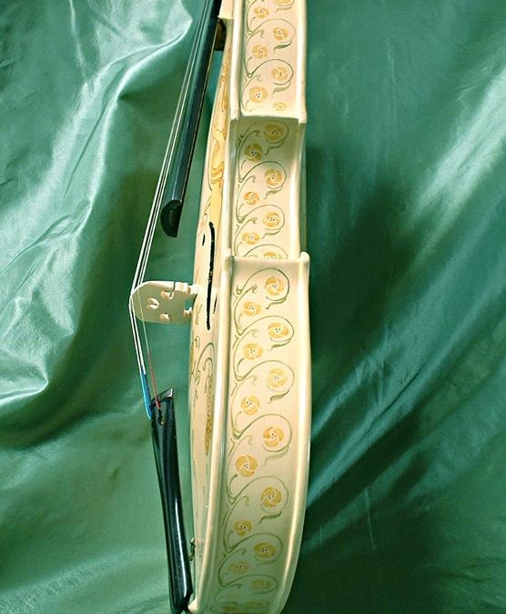 Jugendstil violin — rib detail showing scrolling rose ornament