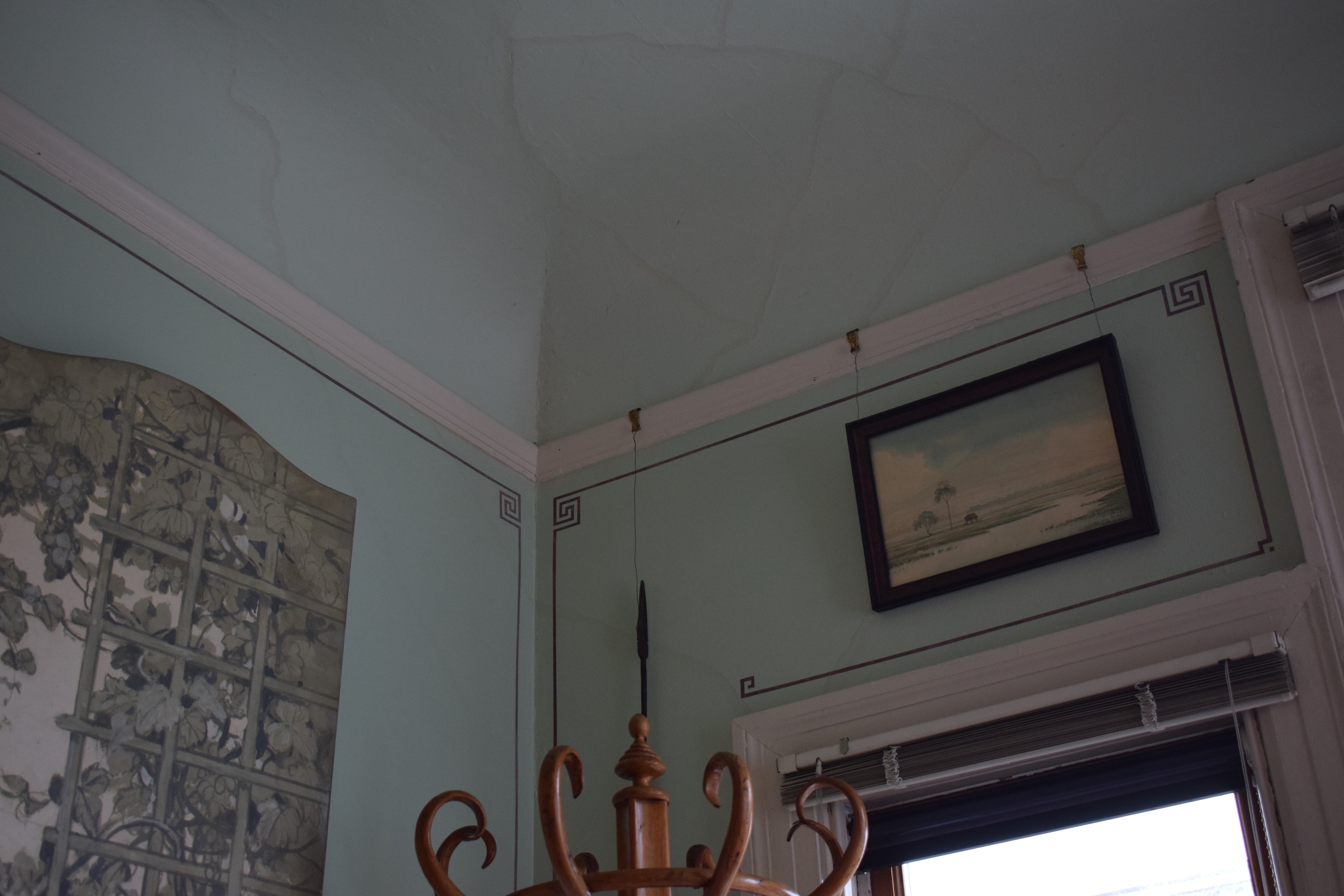 Close-up of neoclassical ceiling banding and painted ornamental detail